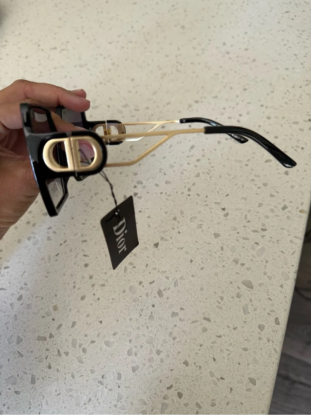 Generic Black Frame Sunglasses with Gold Temples and Purple Gradient Lenses